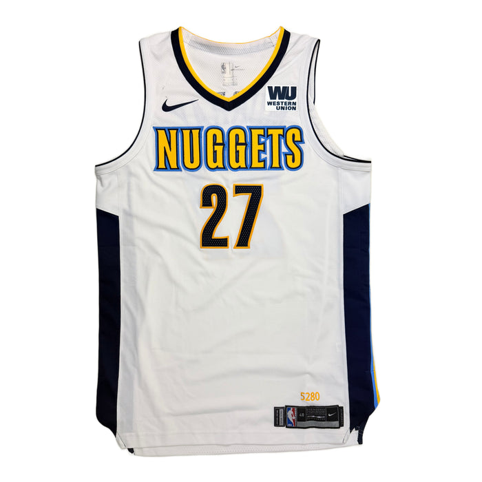 Front view White basketball jersey with 'Nuggets' in gold with navy and light blue outline and number '27' in navy with yellow outline, navy Nike Swoosh and Navy and White WU Sponsorship patch on a white background