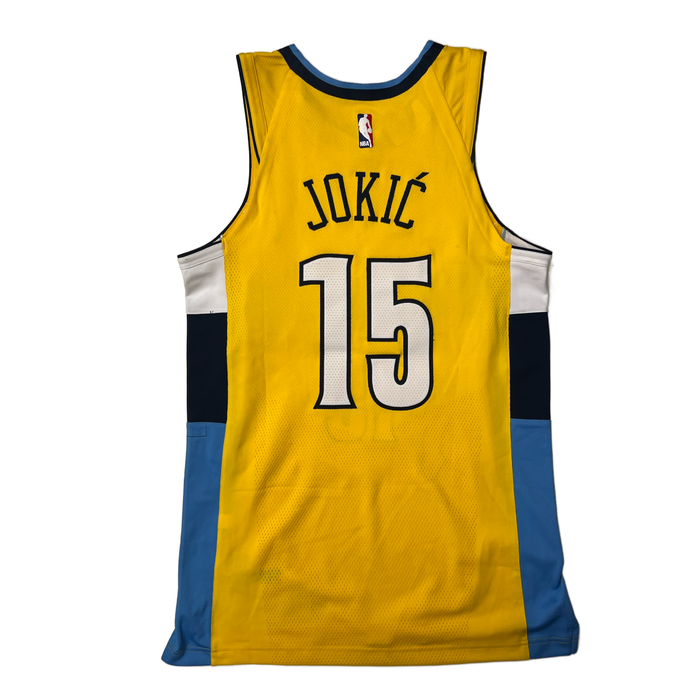 Back view Yellow basketball jersey with 'Jokic' in navy and number '15' in white with Navy outline on a white background