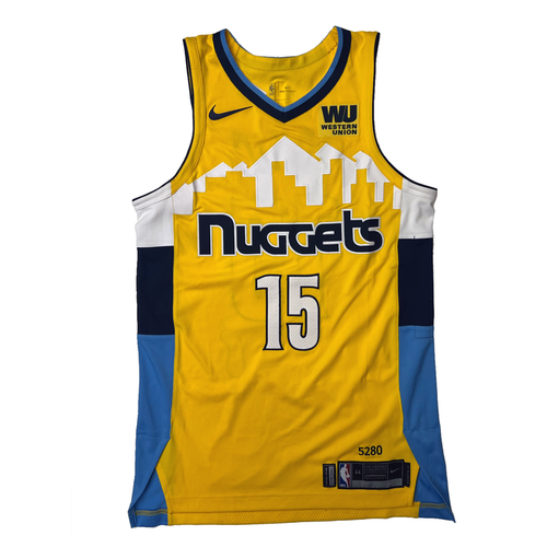 Front view Yellow basketball jersey with 'Nuggets' in navy and white outline and number '15' in white with Navy outline, navy Nike Swoosh and WU Sponsorship patch in navy and gold on a white background