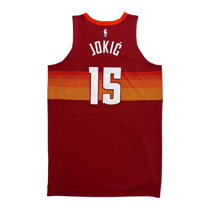 Back view Red basketball jersey with 'JOKIC' in white and number '15' in white with red outline on a white background