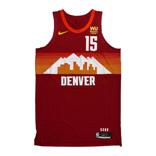 Front view Red basketball jersey with 'Denver' in white and number '15' in white, red, orange and yellow gradient lines with white mountain design outline on a white background