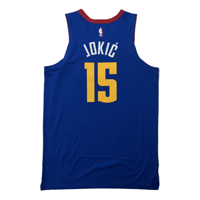 Back view Royal Blue basketball jersey with 'JOKIC' in white and number '15' in yellow on a white background