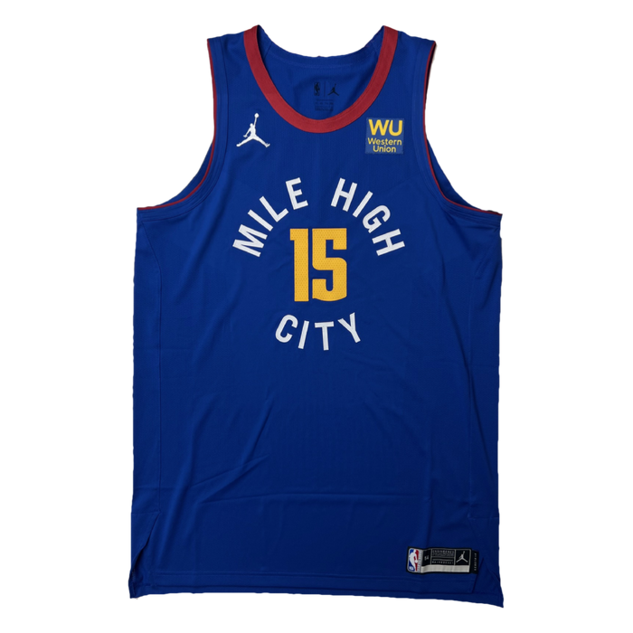Front View, Royal Blue basketball jersey with 'Mile High City' in white and number '15' in gold, White jumpman logo and WU Sponsorship patch in yellow text and royal blue patch on a white background