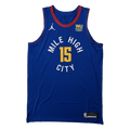 Front View, Royal Blue basketball jersey with 'Mile High City' in white and number '15' in gold, White jumpman logo and WU Sponsorship patch in yellow text and royal blue patch on a white background
