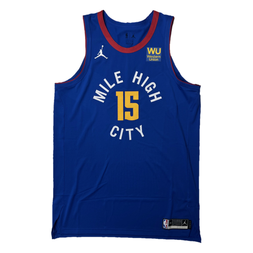 Front View, Royal Blue basketball jersey with 'Mile High City' in white and number '15' in gold, White jumpman logo and WU Sponsorship patch in yellow text and royal blue patch on a white background