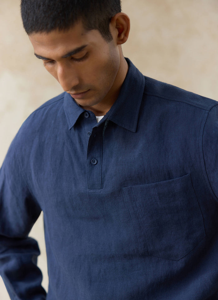 Navy blue Alec Pullover shirt by Percival in 100% linen, showing the half-placket and chest pocket detail.