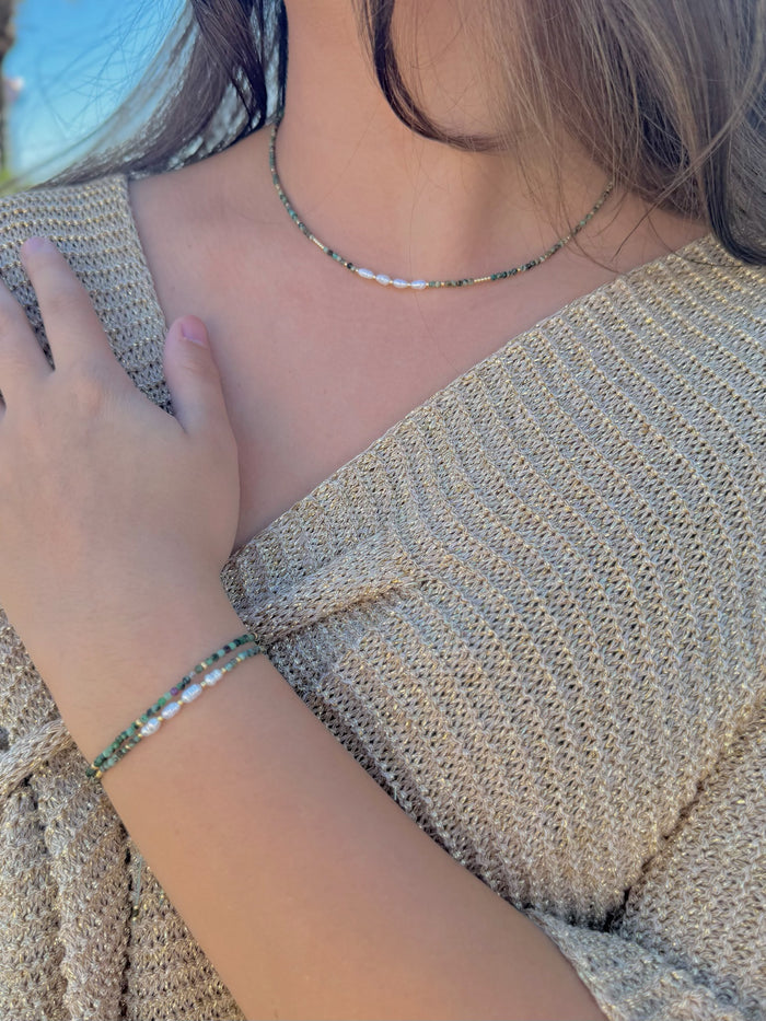 Amina African Turquoise bracelet on model styled with necklace and solid African turquoise bracelet