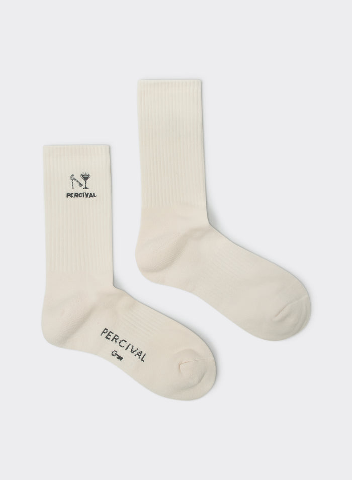Percival Aperitivo embroidered socks in cream ribbed cotton-blend, featuring black cocktail motifs, shown flat.