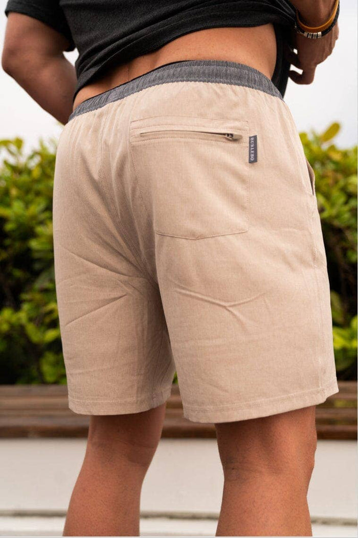 Heather khaki athletic short with Driftwood Camo liner — women's performance shorts | All Put Together
