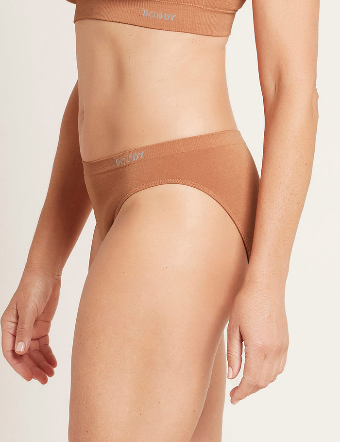 Brown underwear set with 'Boody' branding on a beige background