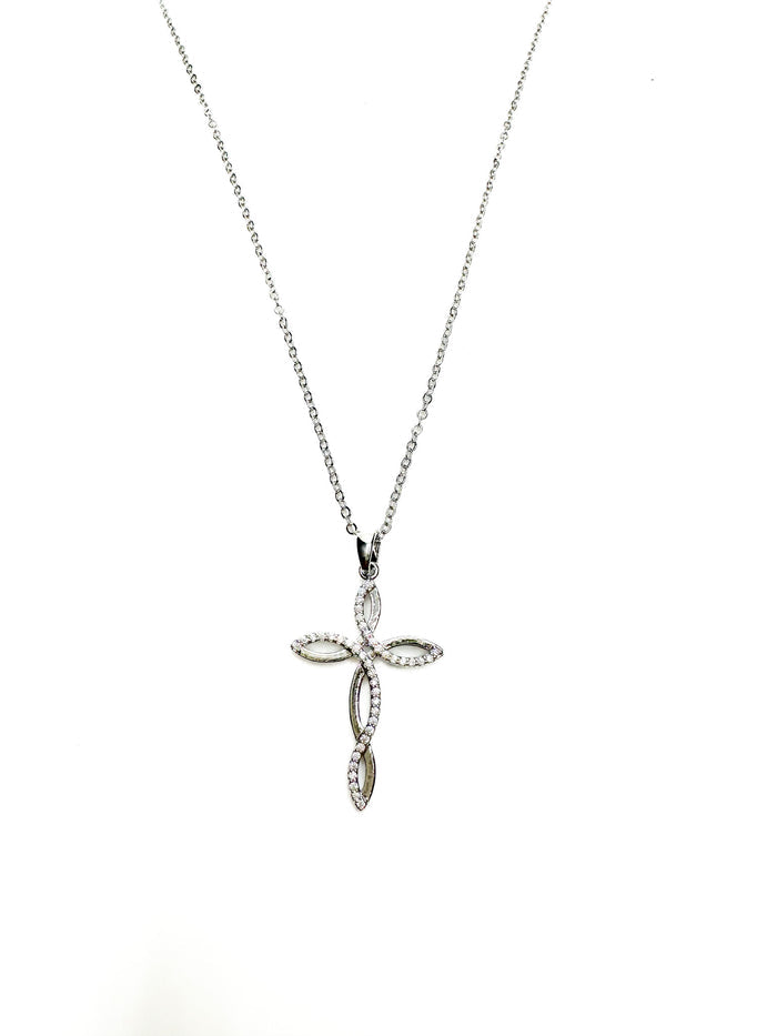 Silver cross pendant necklace on a white background