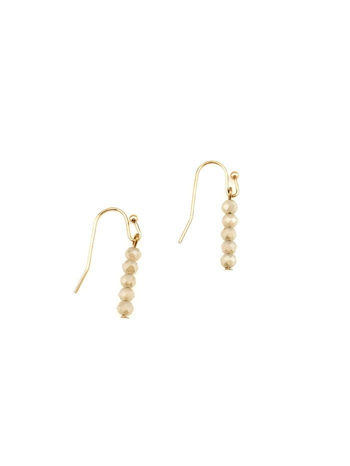 Cora Earrings with faceted neutral beads on gold hooks at Ardor Boutique.