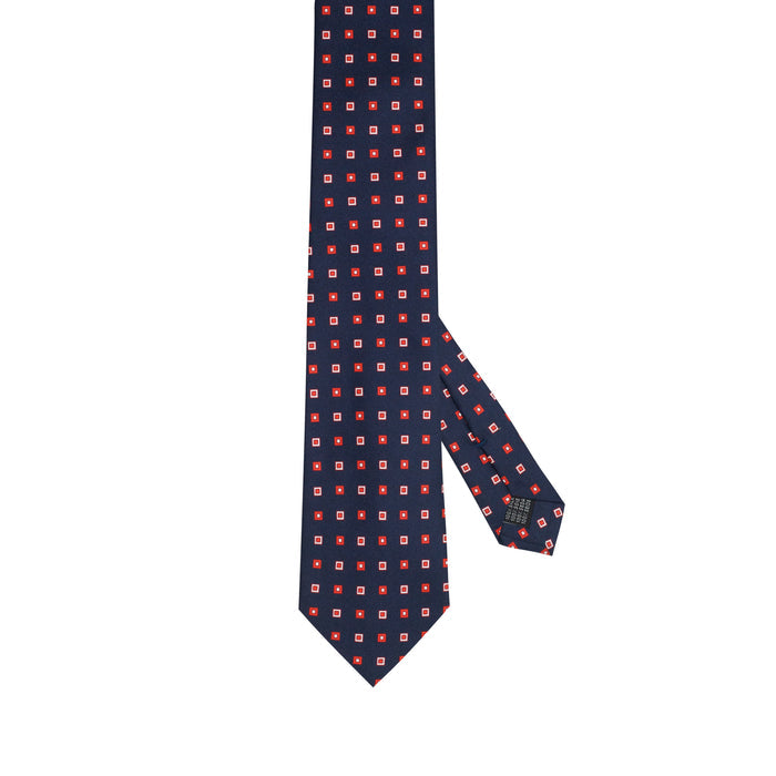 Cravatta in seta italiana blu navy con micro motivo geometrico
