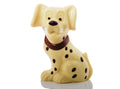 A sitting white chocolate dalmation dog with dark chocolate spots and collar.