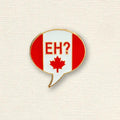 Pin with a speech bubble design featuring the Canadian flag and the word 'EH?' on a beige background