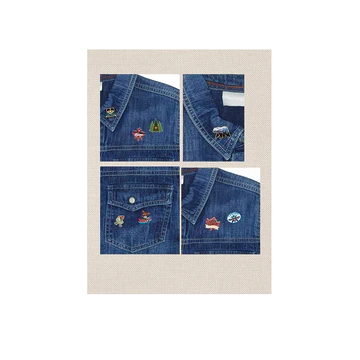 Four panels of blue denim fabric with embroidered designs on a beige border.