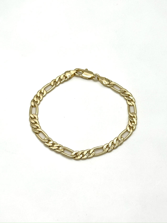 Ella Gold Chain Bracelet with flat polished gold-tone links arranged in a circle on a white background