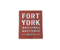 A red square magnet. Fort York National Historic Site in white letters.
