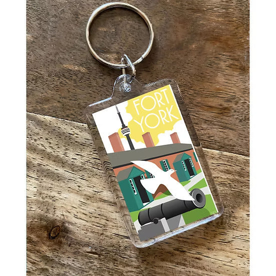 Keychain with Fort York design on a wooden surface