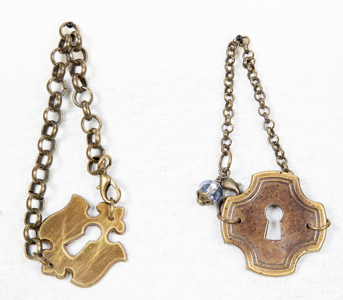 Two bracelets made from antique key plates
