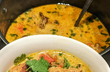bowl of creamy curry with vegetables