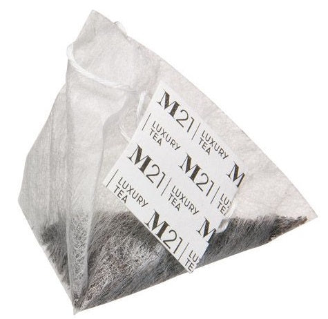 Luxury tea pyramid bag on a white background