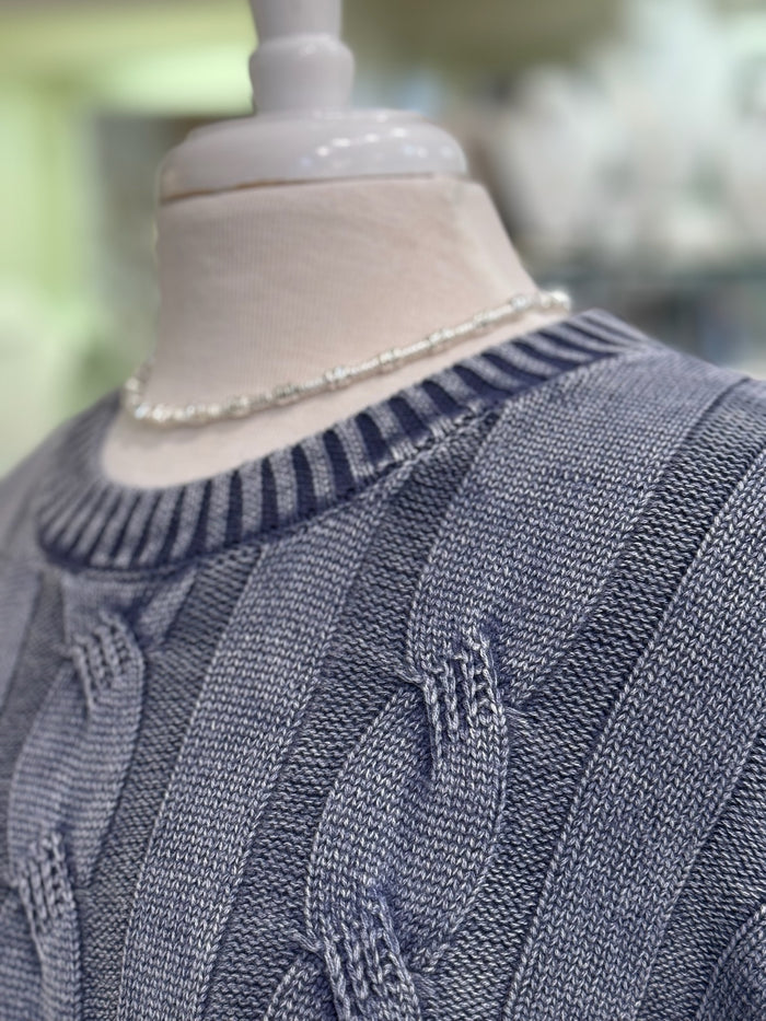 Blue cable knit sweater