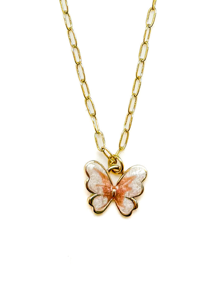 Butterfly pendant necklace on a gold chain with a white background