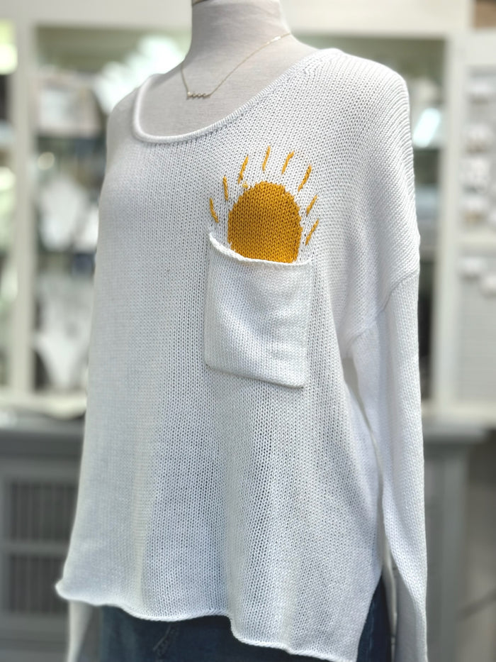 Ivory scoop neck sweater with sun design peeking from chest pocket – Ardor Boutique