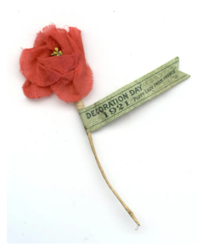 A US poppy from commemoration for Memorial Day in 1921, known as “Decoration Day” at the time. Canadian poppies used a similar design. Source: Canadian War Museum, “Poppy” (1921)