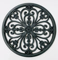 A round rubber stepping stone with wrought iron styling