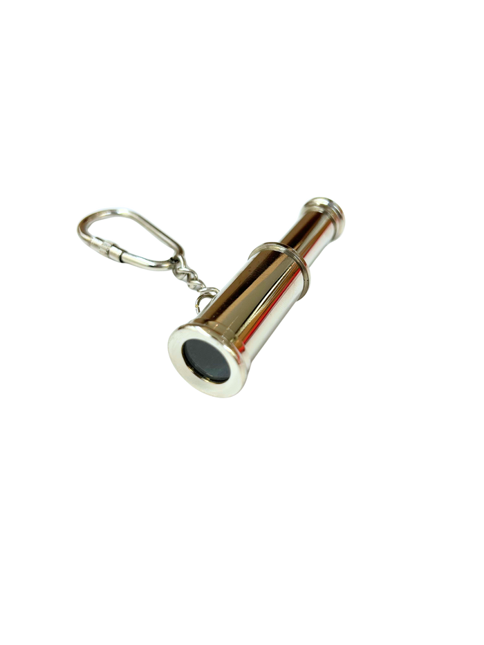 Metallic keychain with a cylindrical design on a white background