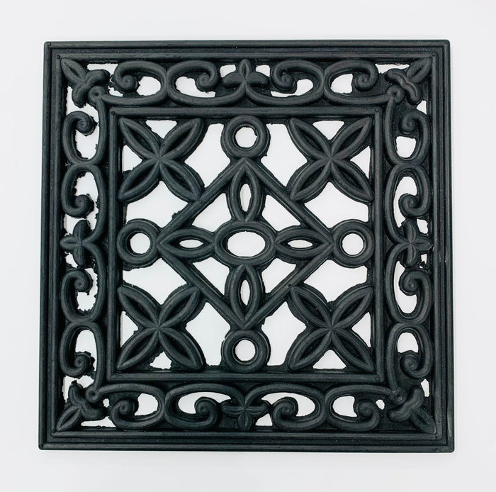 A square rubber stepping mat with Scroll and Diamond styling