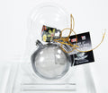 Mesh tea ball with tea cup ornament