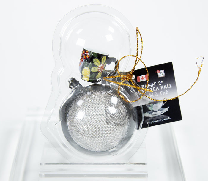 Mesh tea ball with tea cup ornament