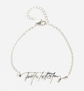 Stainless steel bracelet with "Tell the Full Story" in custom handwriting
