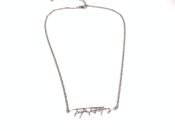 Stainless steel necklace with "Tell the Full Story" in custom handwriting