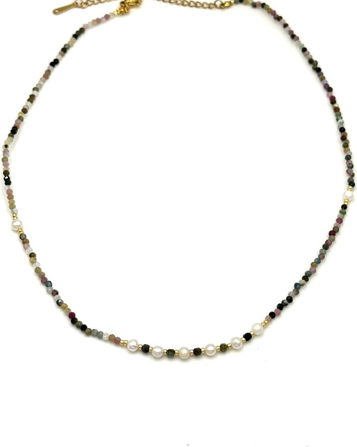 Necklace with multicolored beads on a white background