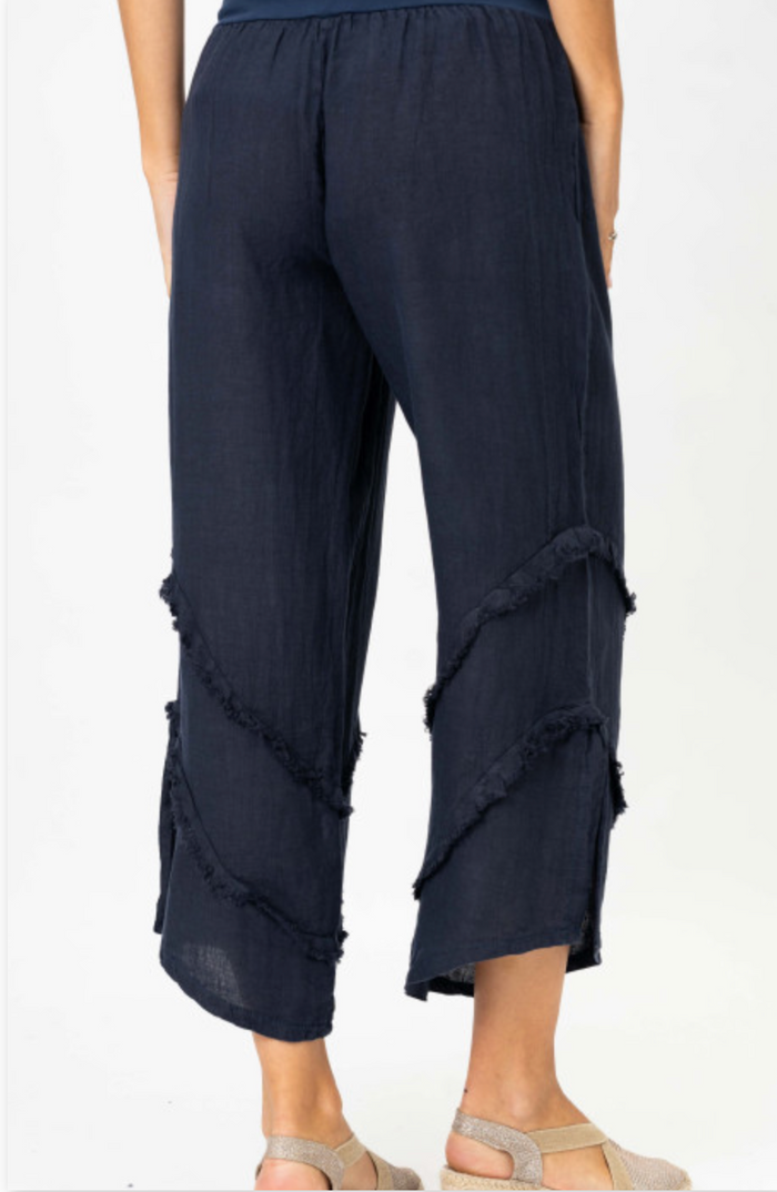 navy italian pants shown on a woman