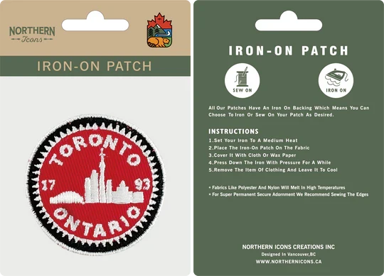 Iron-on patch with 'Toronto, Ontario' design on Northern Icons packaging.